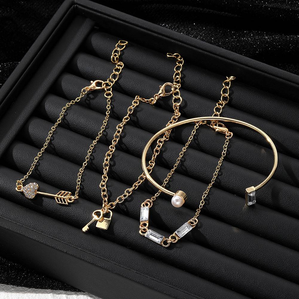 Jessica Set of 4 Assorted Cubic Zirconia Charm Bracelets Jewelry Wholesale